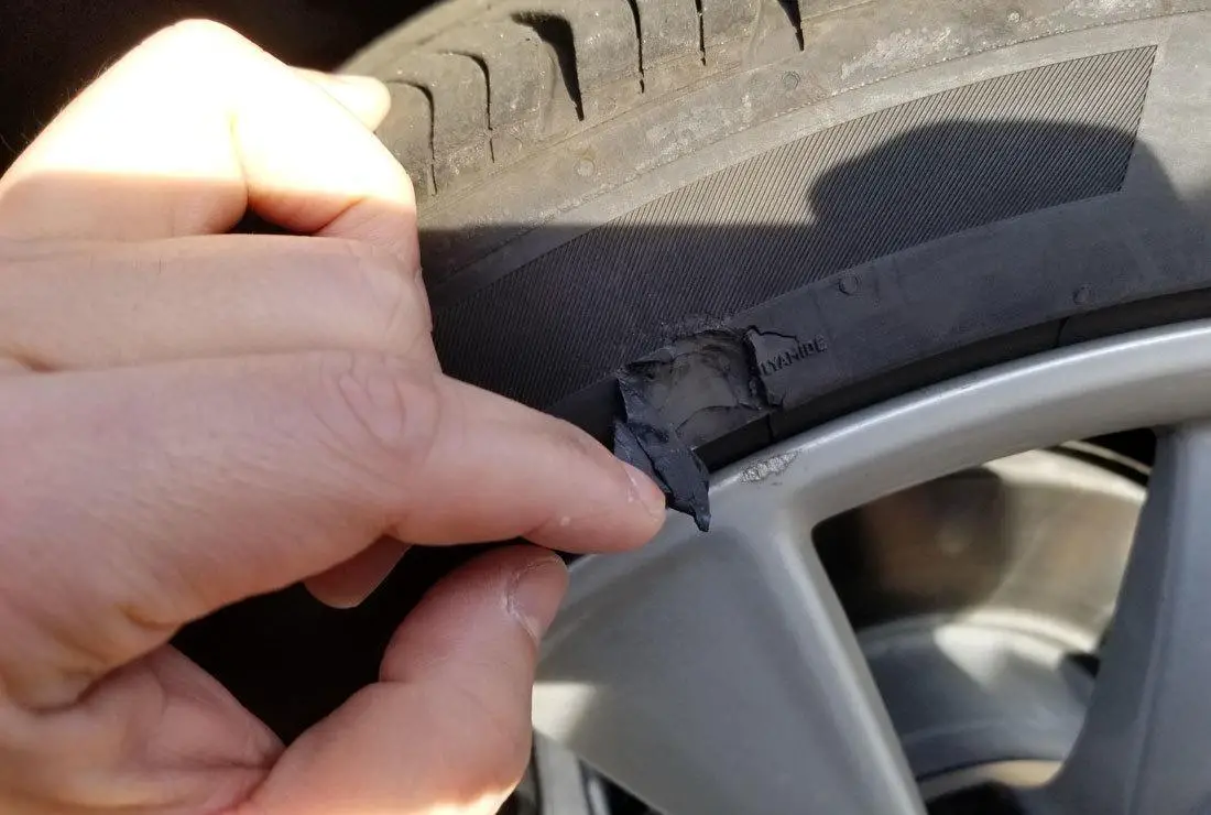 fixing a flat tire near sidewall